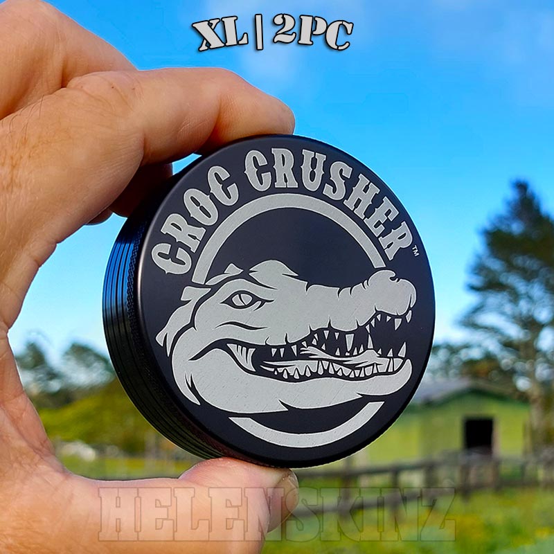 Holding Black XL Croc Crusher Herb Grinders NZ