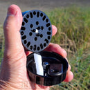 The bottom compartment of the EasyRoo Herb Grinder containing tools NZ