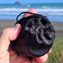 Holding an EasyRoo 3pc 63mm Non-Stick Grinderoo Grinder in it's bag NZ