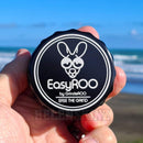 Holding an EasyRoo 3pc 63mm Non-Stick Grinderoo Grinder at Muriwai Beach NZ