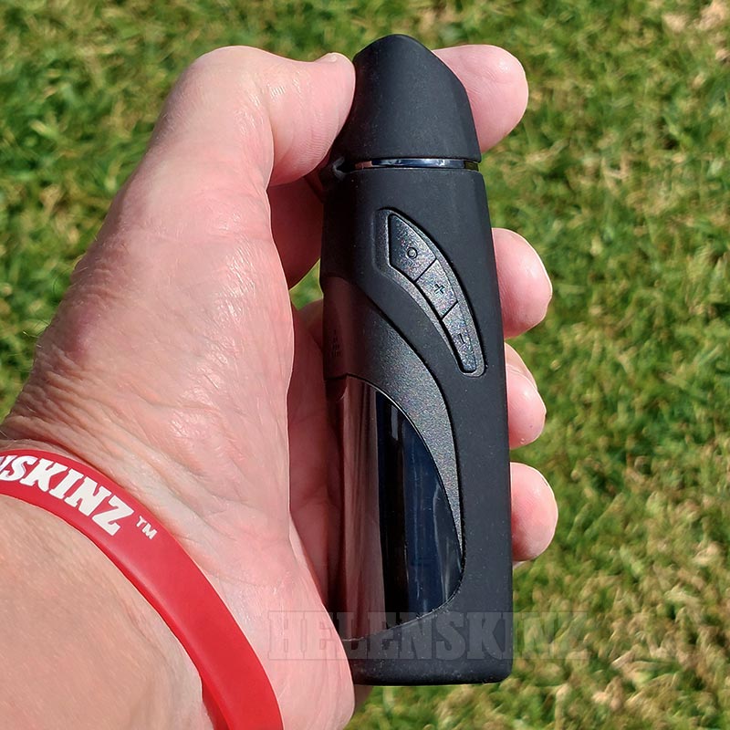Holding a G Pen Elite II medical vaporizer with Silicone Skin showing buttons NZ