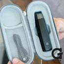 Black Grenco Medical Elite Vaporizer in a gray carrying case with Grenco Medical logo