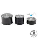 Three black GrindeROO herb grinders sitting flat comparing sizes