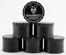 Stack of black GrindeROO grinders with the brand logo NZ