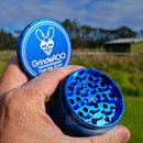 Holding an open Sapphire OG GrindeRoo Herb Grinder NZ