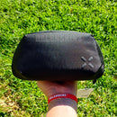 Holding the Black Medium Pax Bag NZ