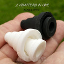 Two adapters, one black and one white, held in a hand with a green background.