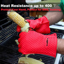 Red heat-resistant glove holding a corn on the cob over a grill, with text about heat resistance and BBQ use.