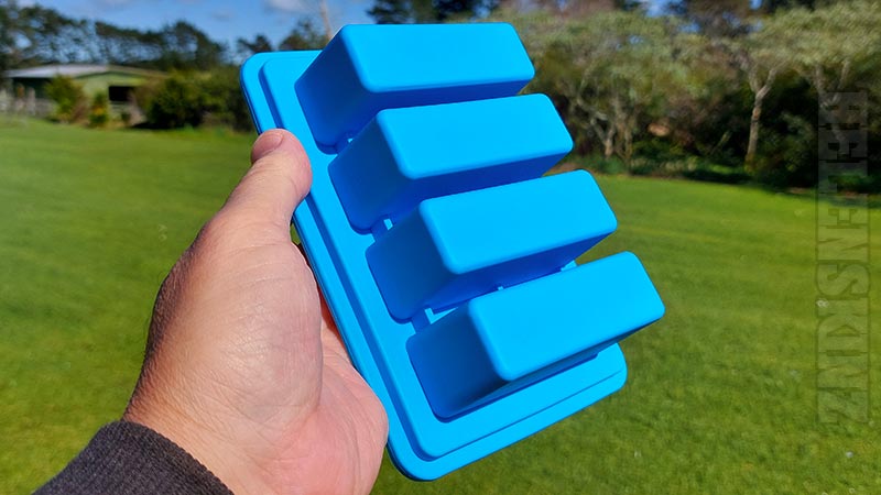 Holding a Blue Butter Tray with Lid for Herbal Infusions NZ - 1