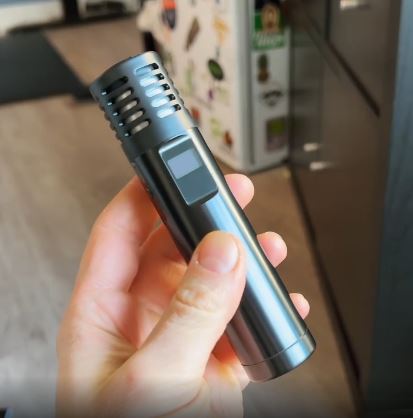 Holding Arizer Air MAX Dry Herb vaporizer by Arizer Canada